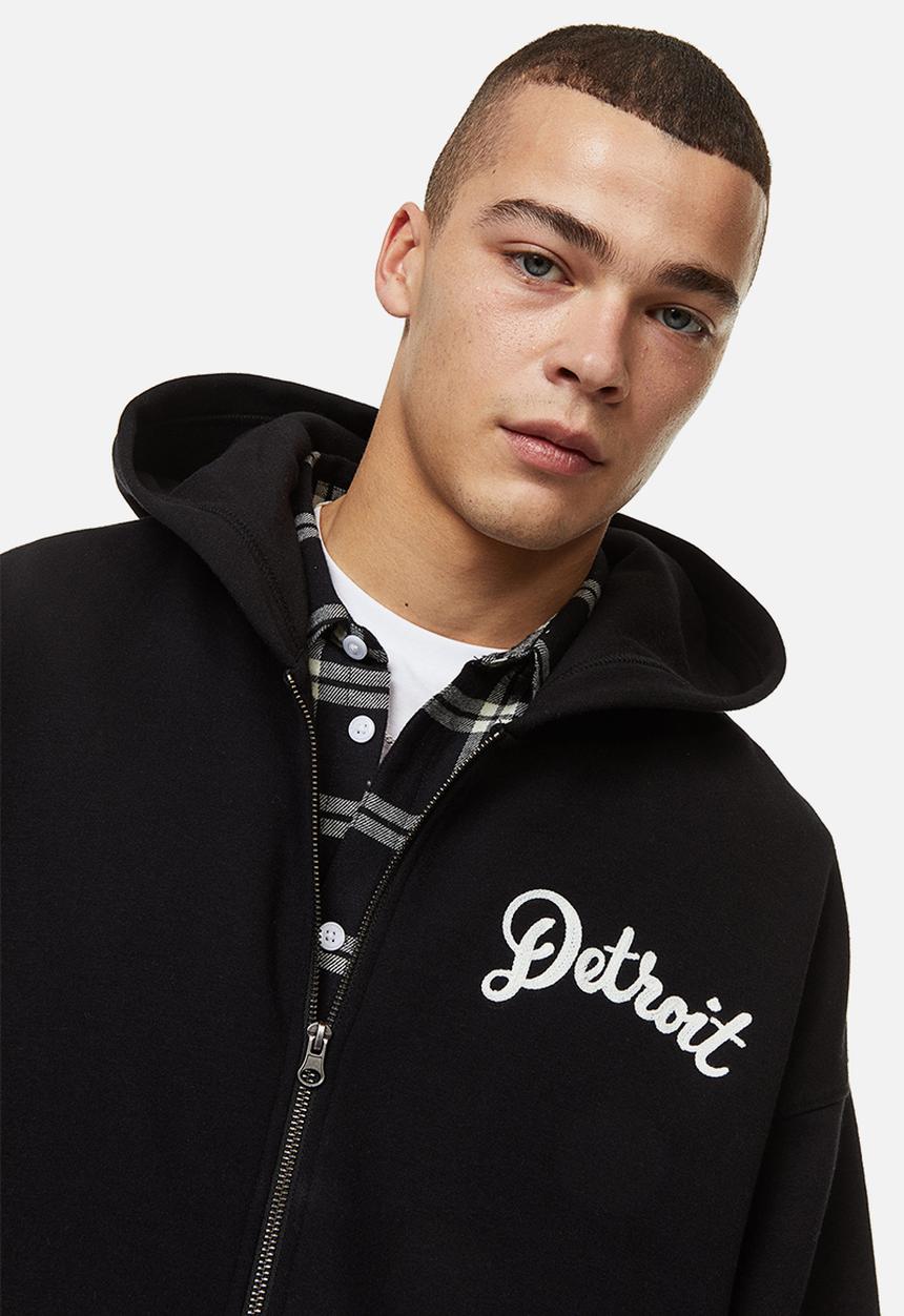 H&M - Oversized fit zip-through hoodie - black/varsity detroit 
