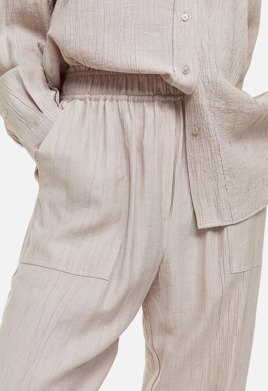 H&M - Tapered trousers - light beige 