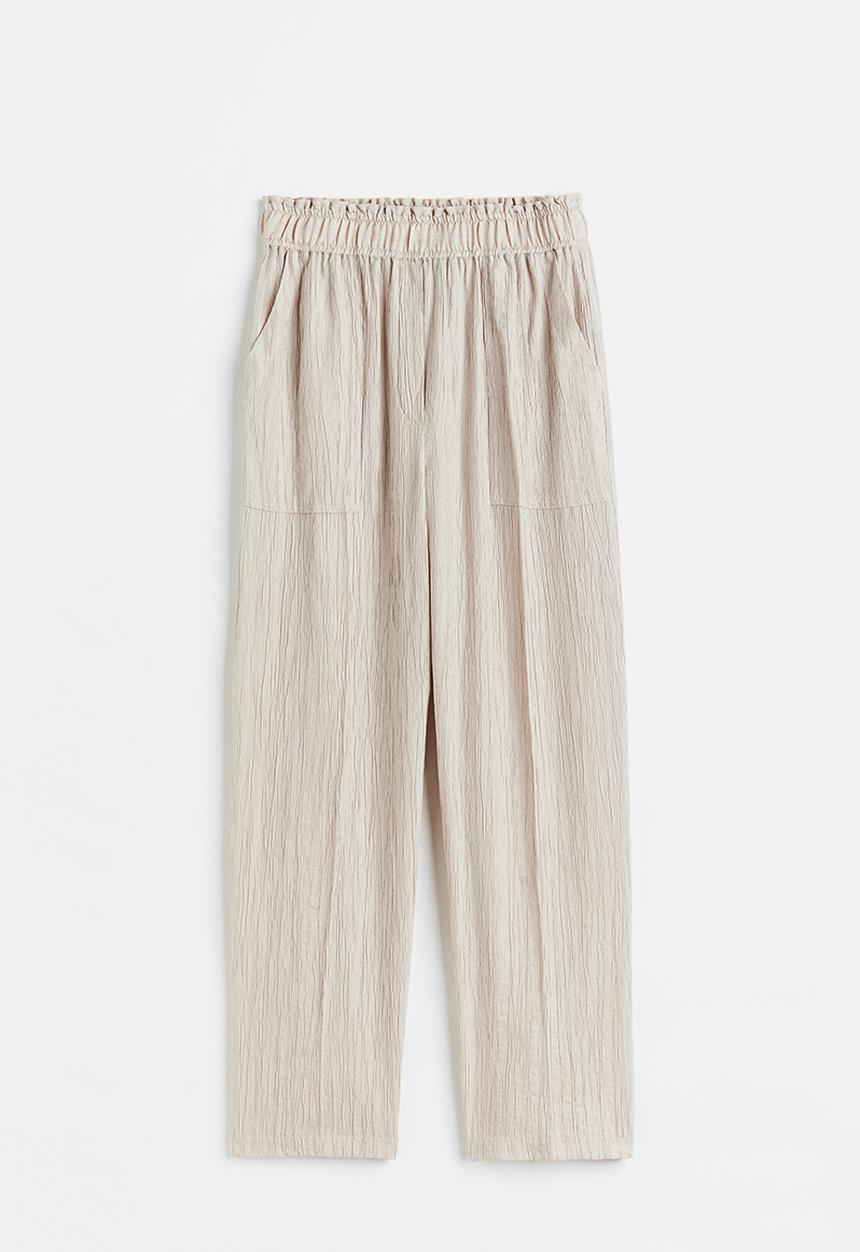 H&M - Tapered trousers - light beige 