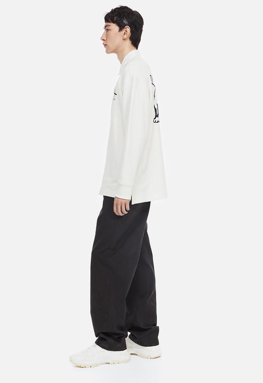 H&M - Relaxed fit printed polo shirt - cream/yale 