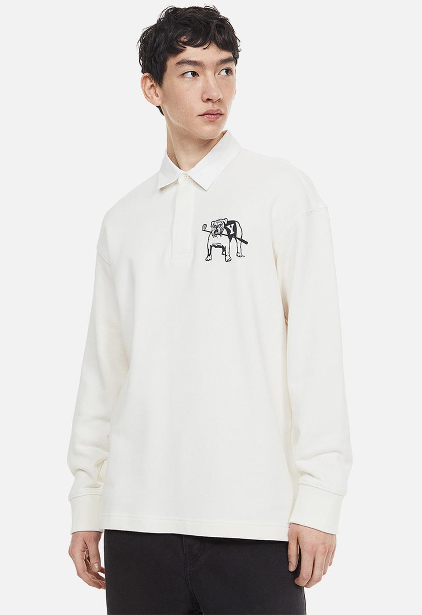H&M - Relaxed fit printed polo shirt - cream/yale 