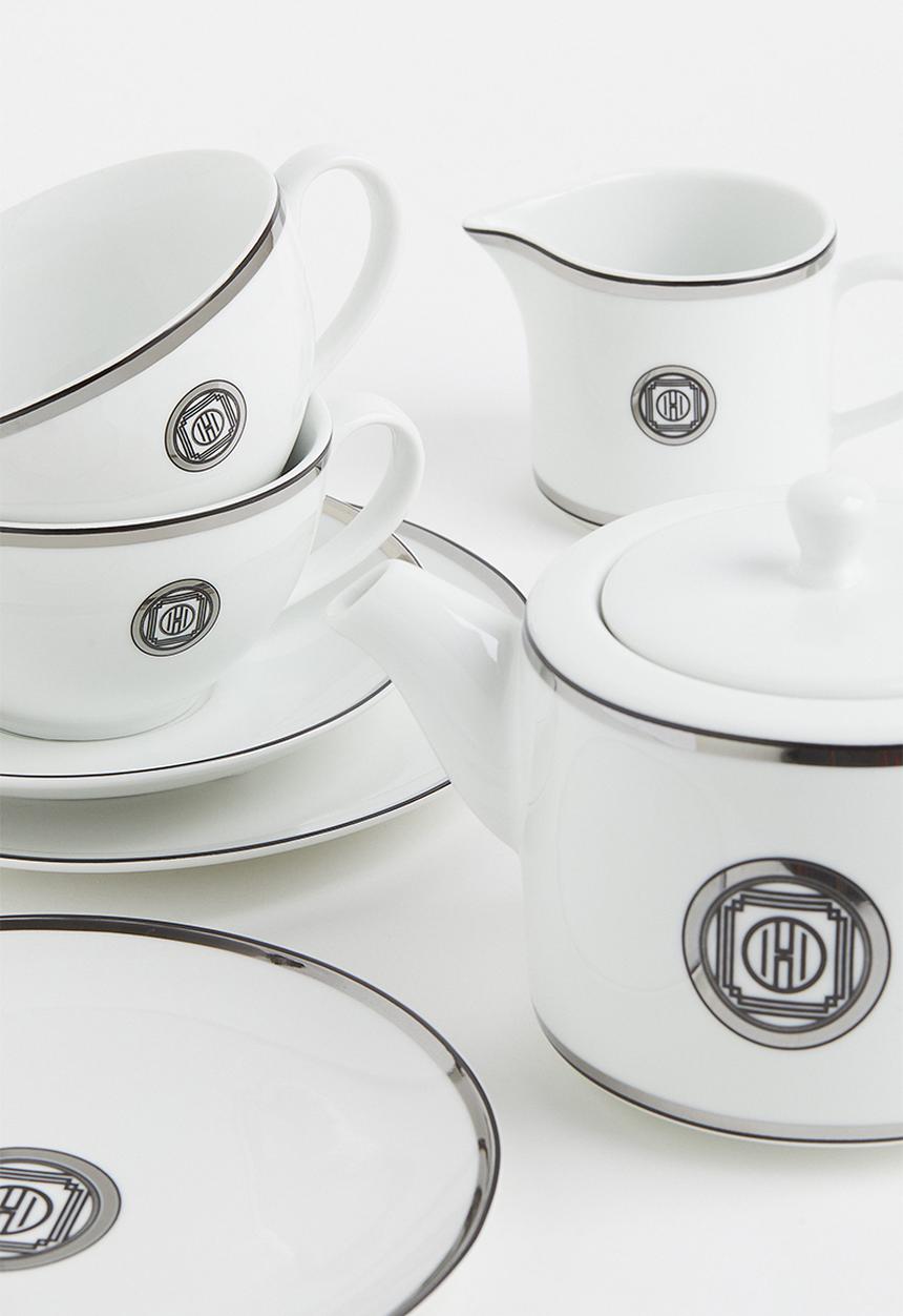 H&M - Porcelain cup and saucer - white / silver-coloured