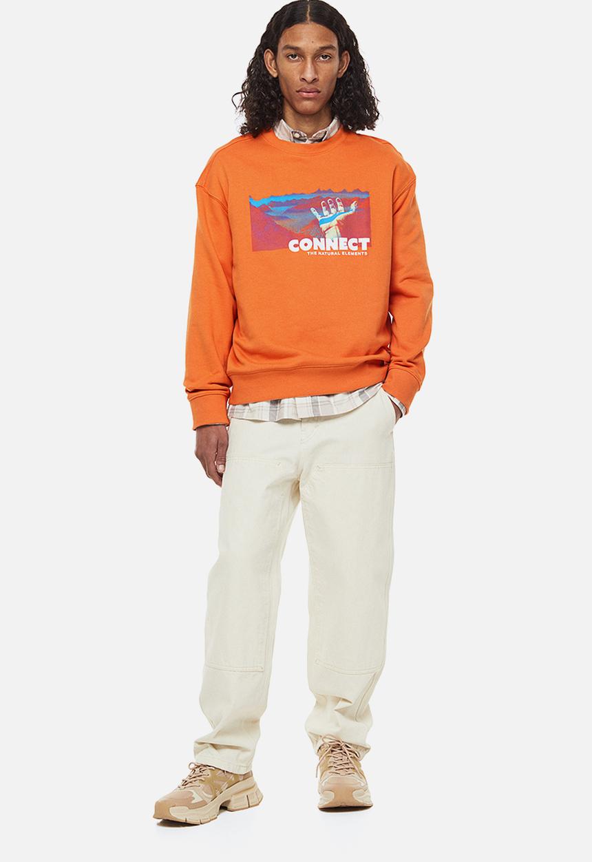 H&M - Relaxed fit printed sweatshirt - orange/connect