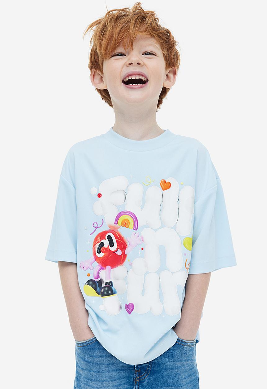 H&M - Eva Cremers x H&M: Oversized printed T-shirt - light blue 