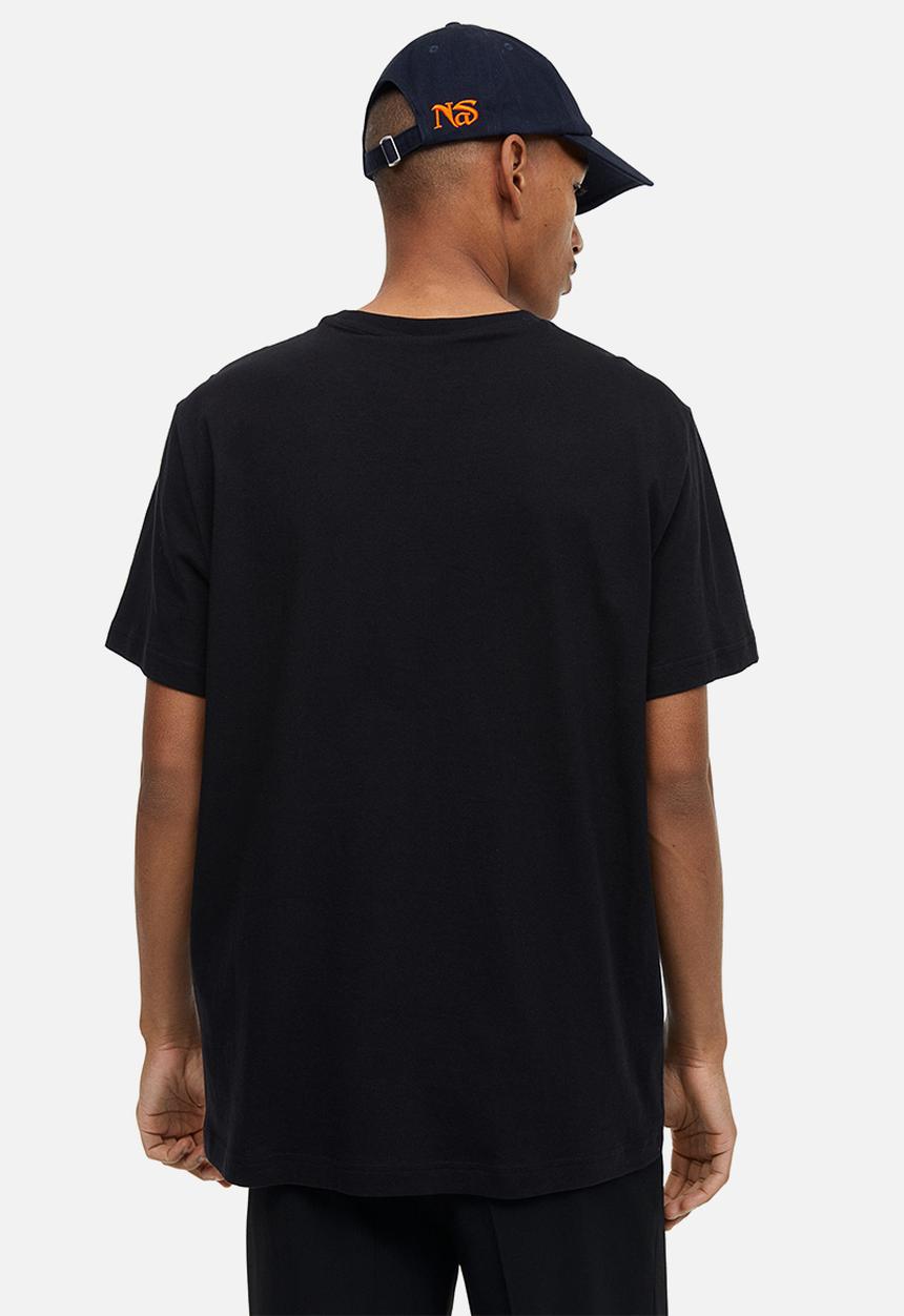 H&M - Regular fit printed T-shirt - black/in all honesty 