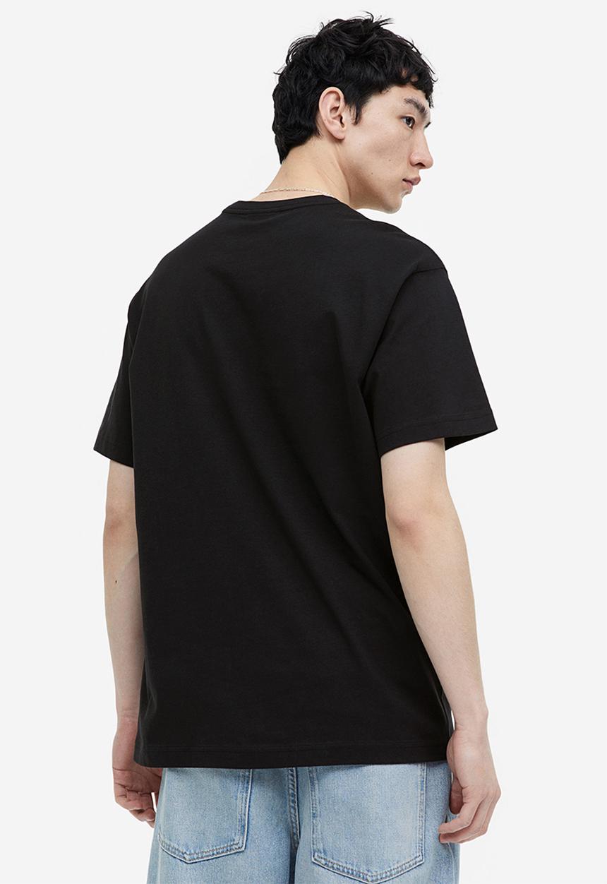 H&M - Relaxed fit printed T-shirt - black/restless youth