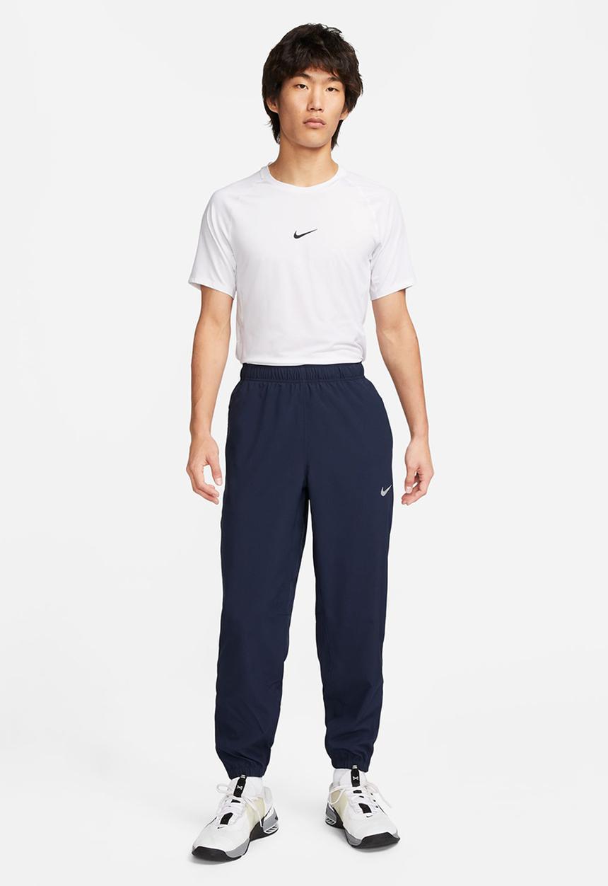 Nike - Dri-FIT Form tapered versatile pants - blue 
