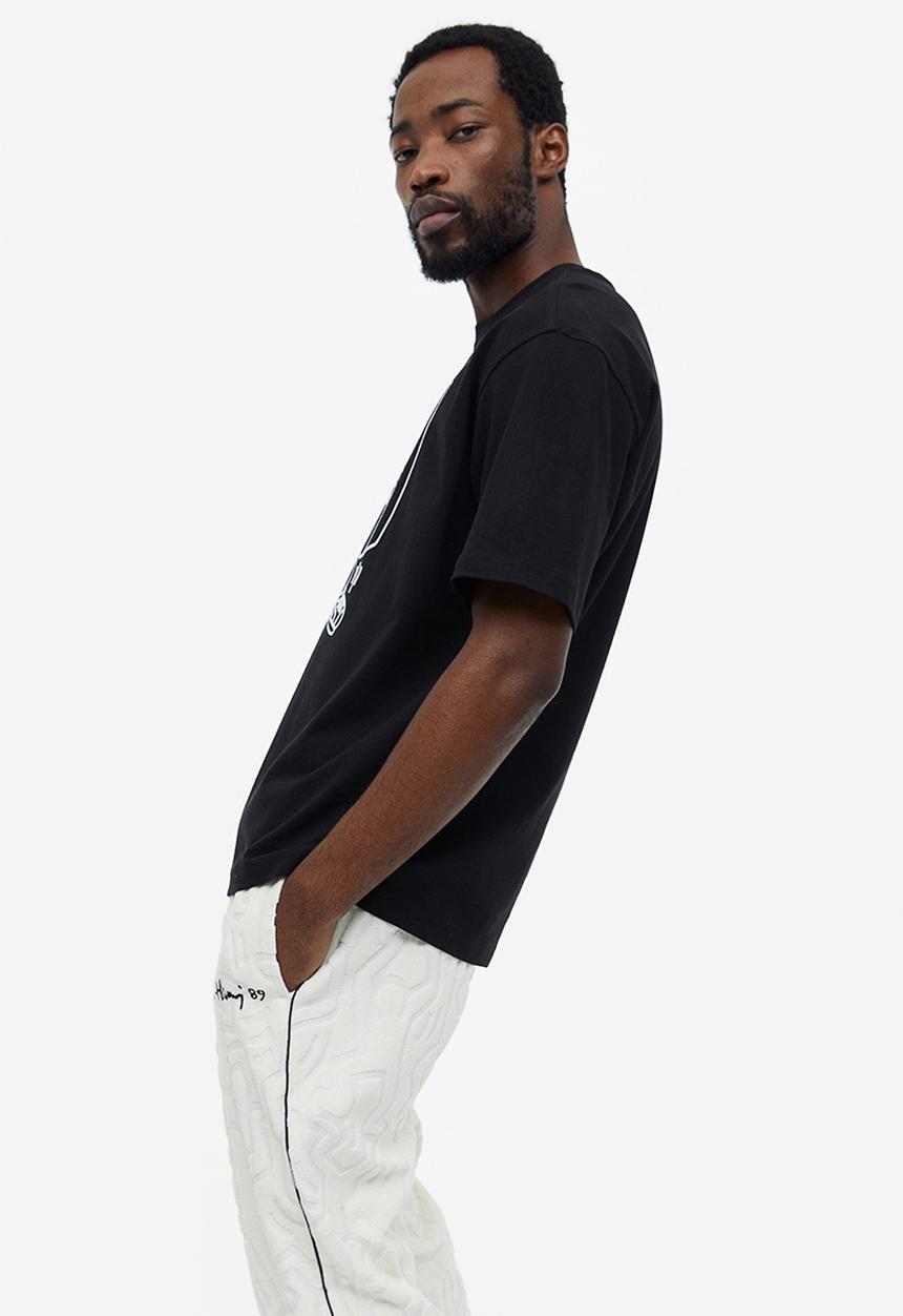 H&M - Relaxed fit printed t-shirt - black/keith haring 