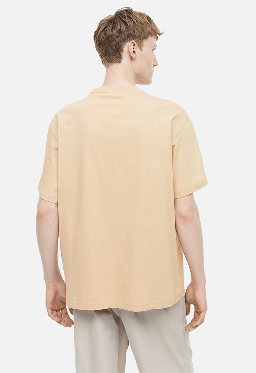 H&M - Relaxed fit printed t-shirt - beige/adventure on my mind 