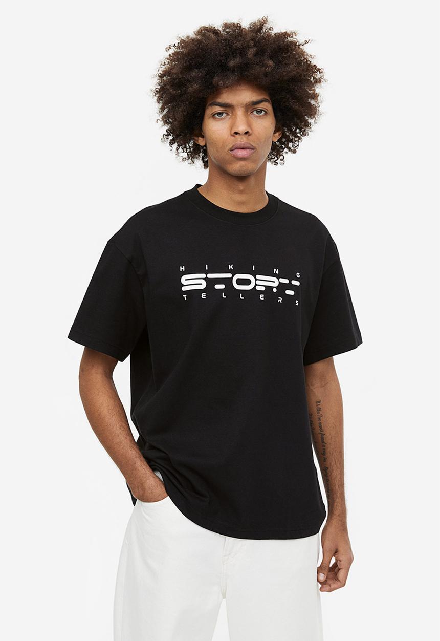 H&M - Relaxed fit printed t-shirt - black/story tellers