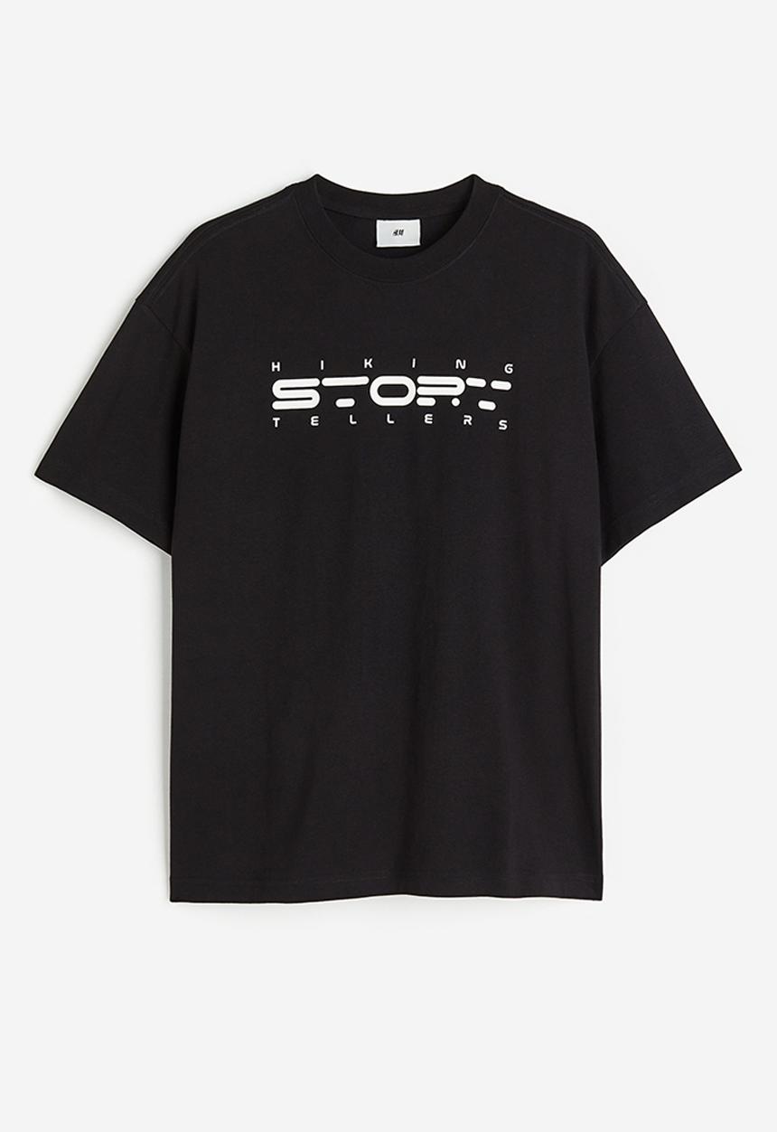 H&M - Relaxed fit printed t-shirt - black/story tellers