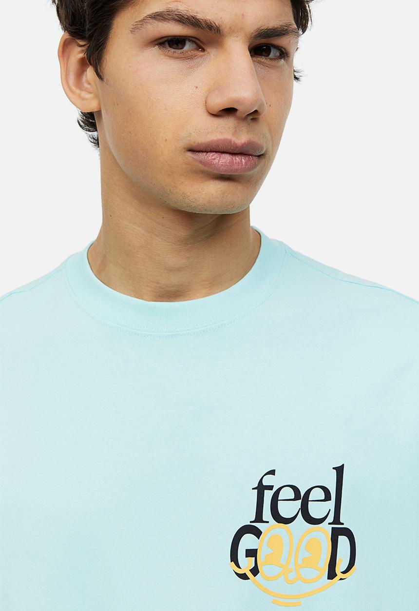 H&M - Relaxed fit printed T-shirt - light turquoise/feel good 