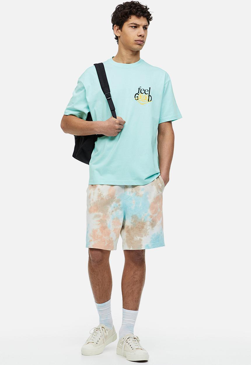 H&M - Relaxed fit printed T-shirt - light turquoise/feel good 