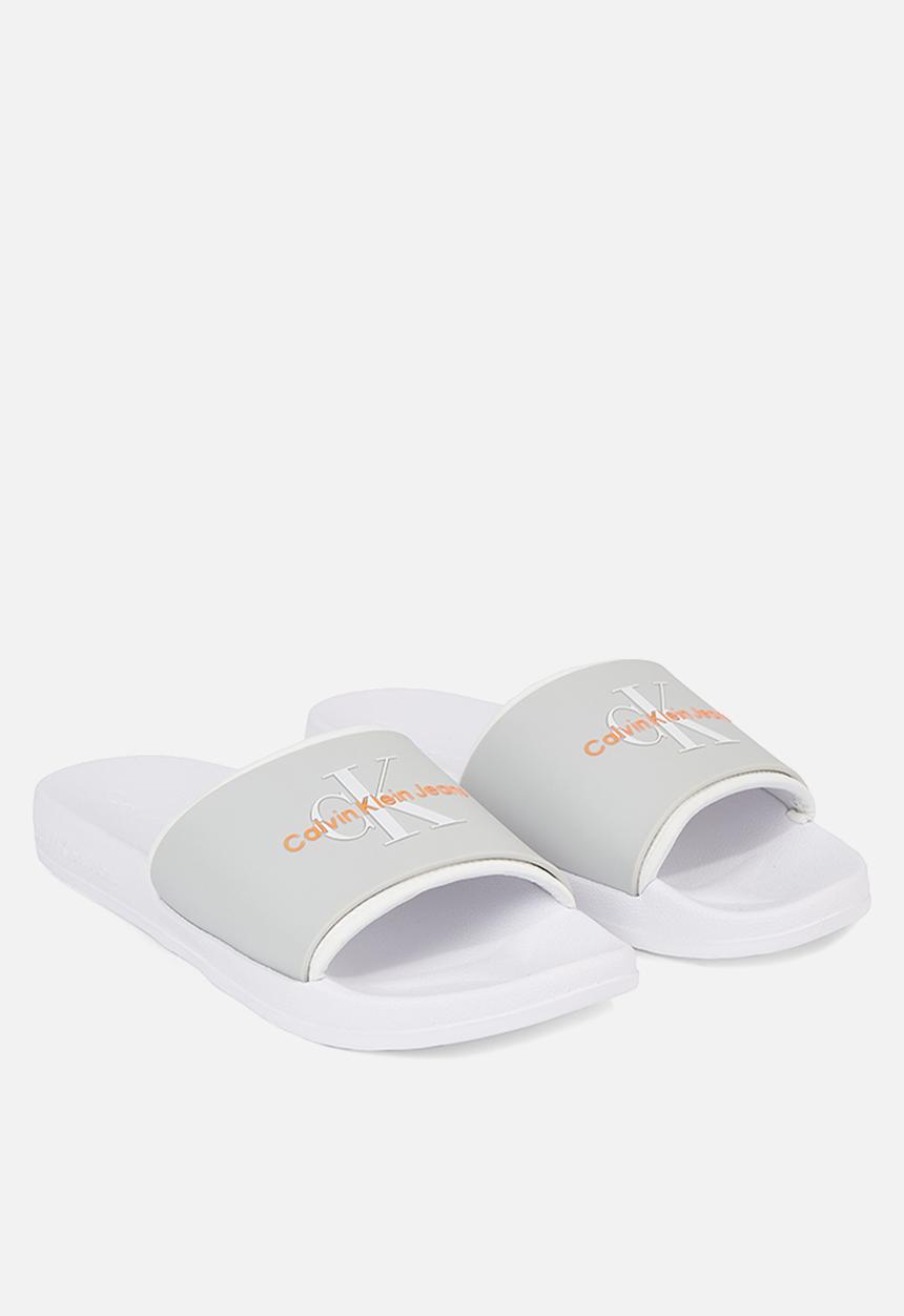 Calvin Klein - Slide monogram tpu - oyster mushroom/white
