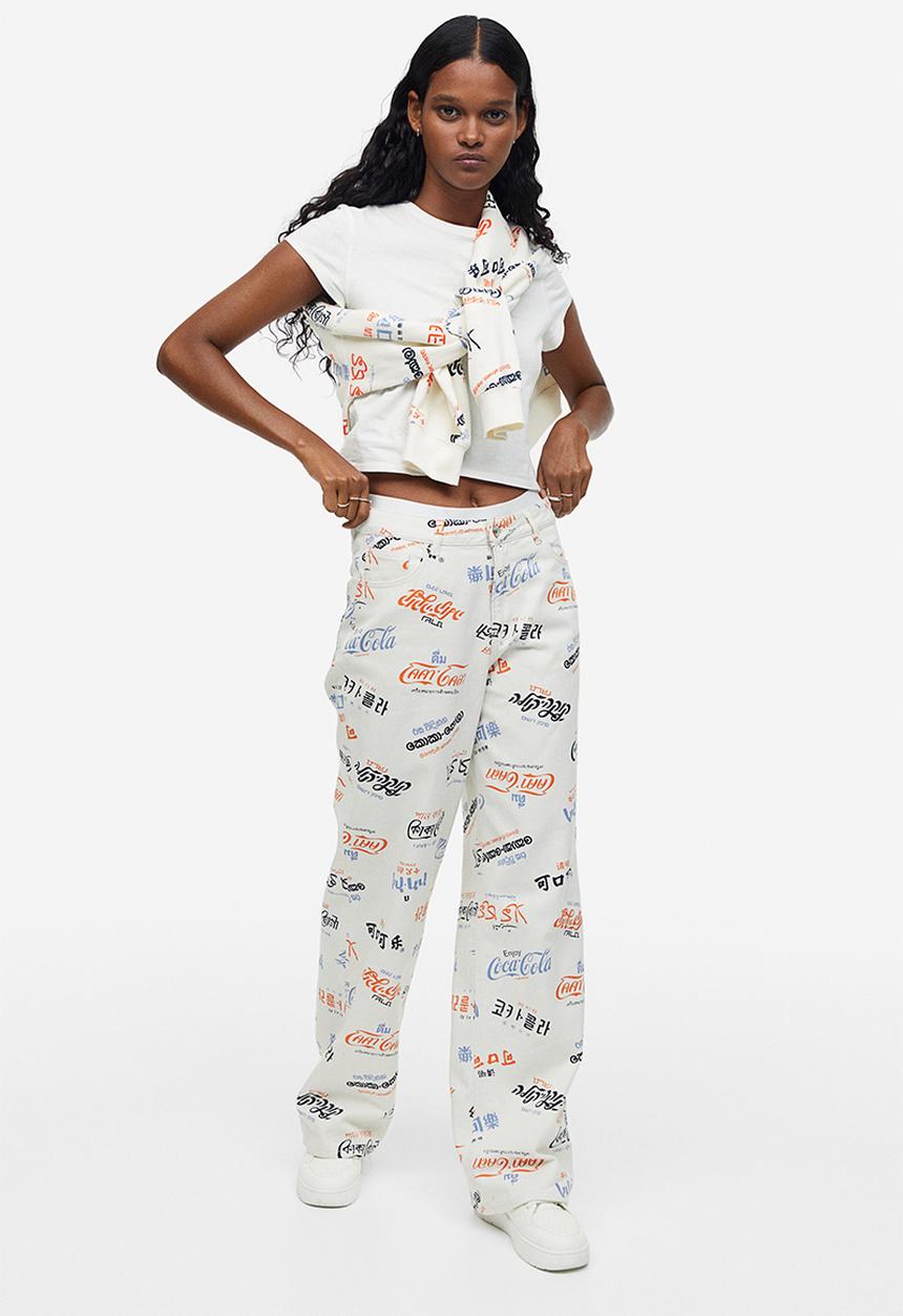 H&M - Printed twill trousers - cream/coca-cola 
