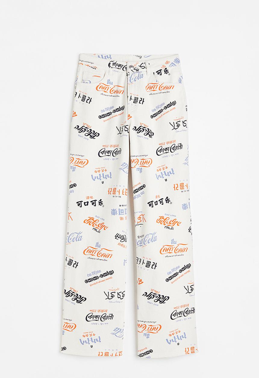 H&M - Printed twill trousers - cream/coca-cola 