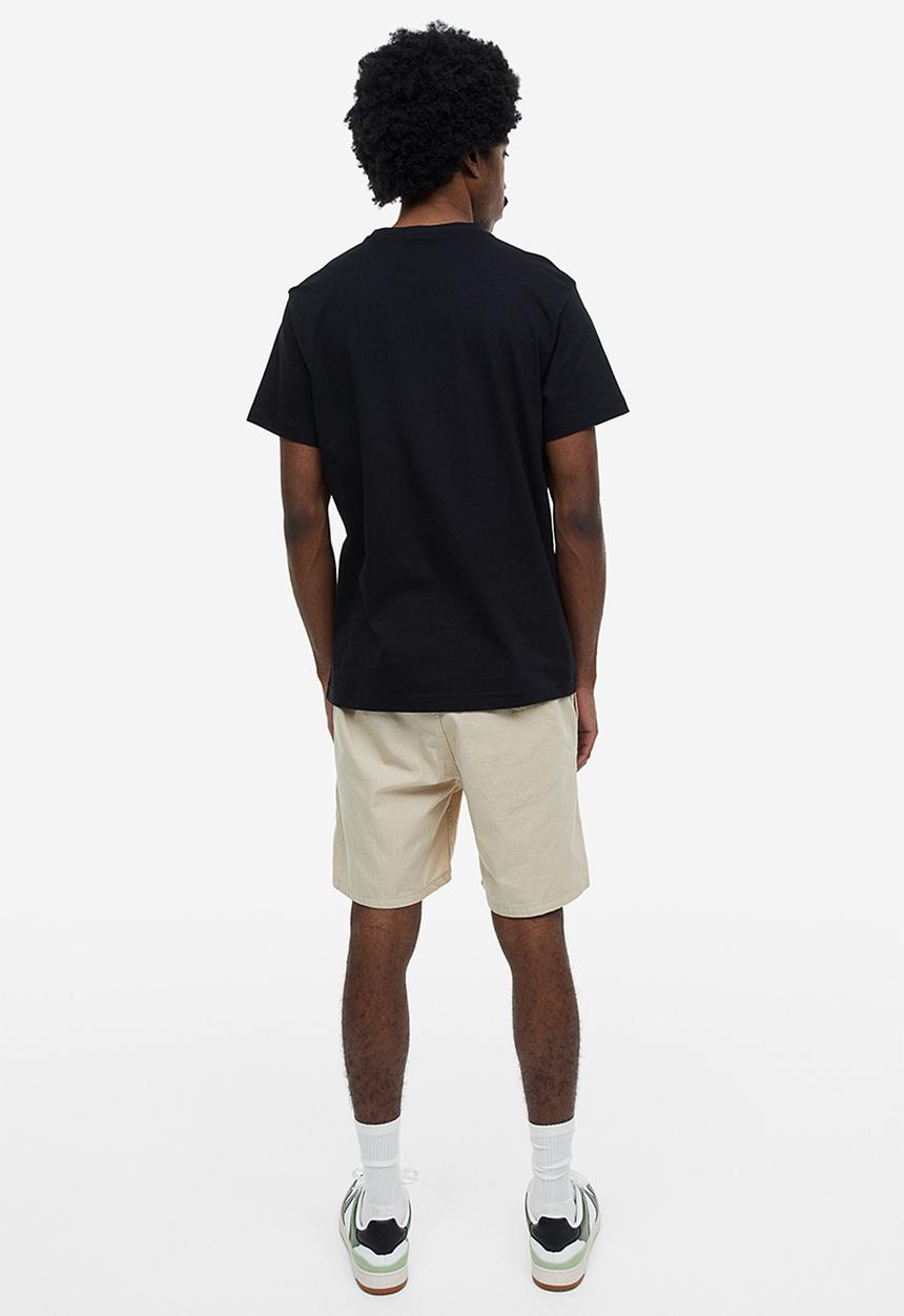 H&M - Regular fit printed T-shirt - black/skaters 