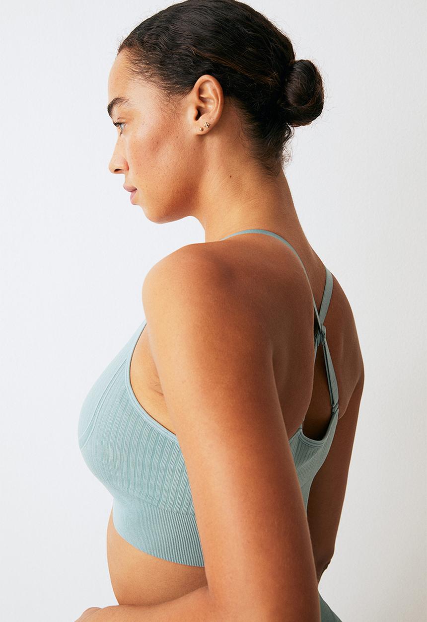 H&M - Drymove™ medium support sports bra - light teal