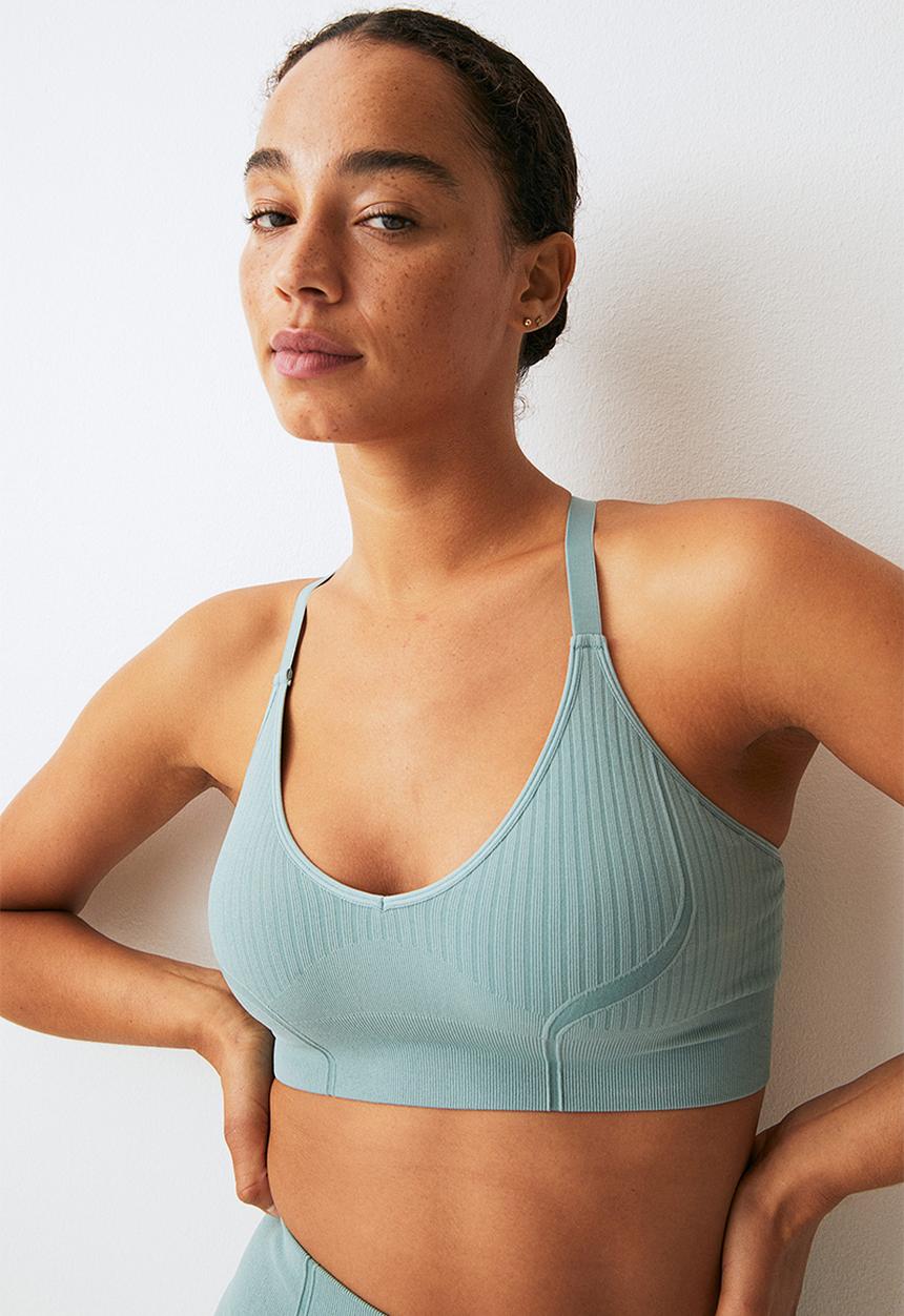 H&M - Drymove™ medium support sports bra - light teal