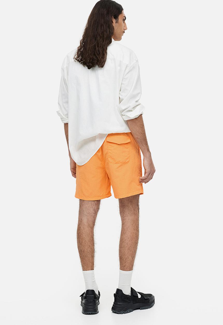 H&M - Regular fit nylon shorts - orange