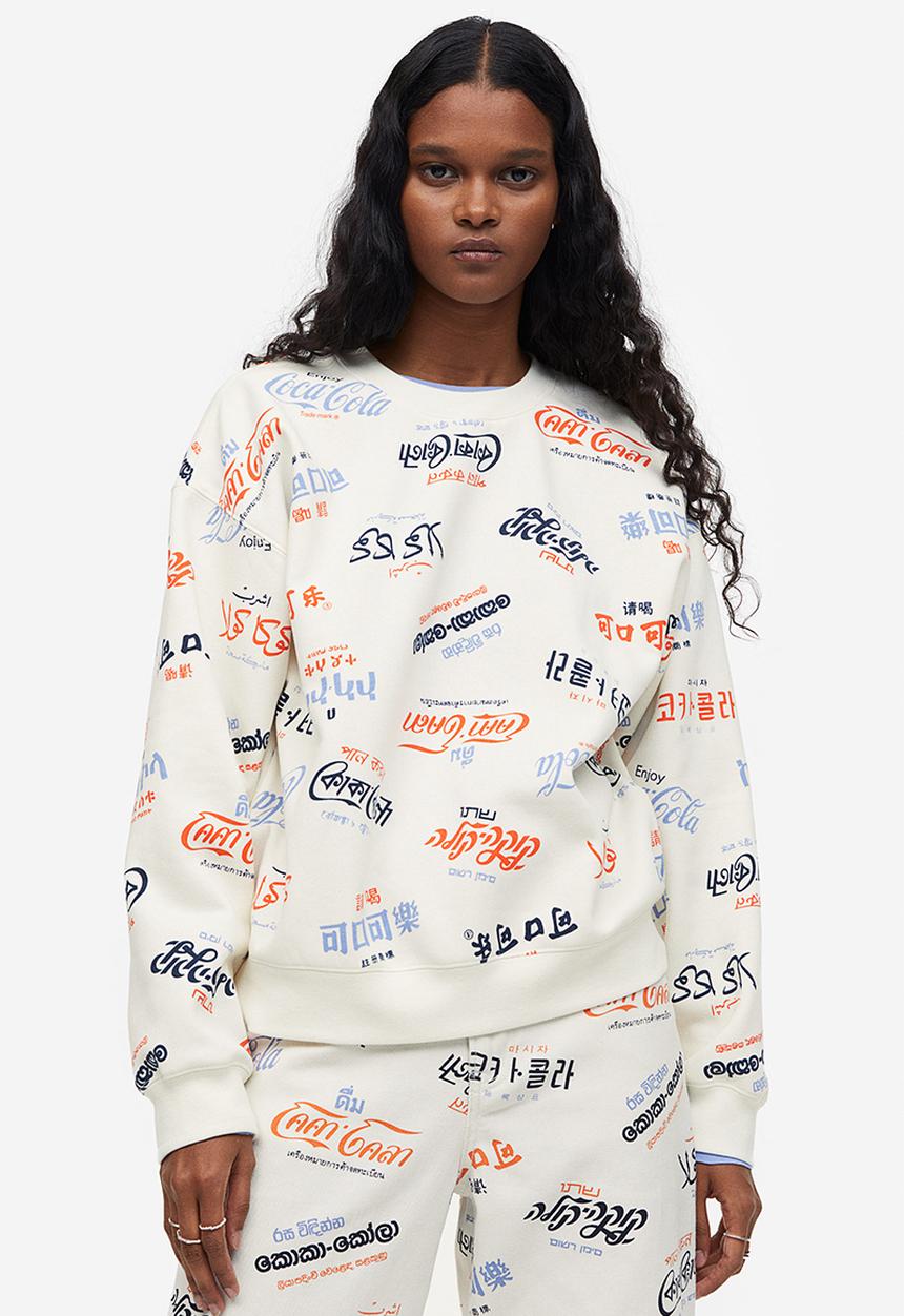H&M - Printed sweatshirt - cream/coca-cola 