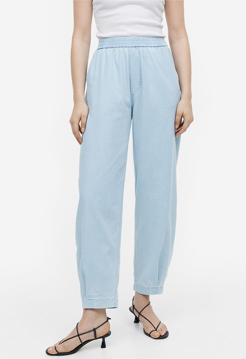 H&M - High-waisted woven joggers - light denim blue 