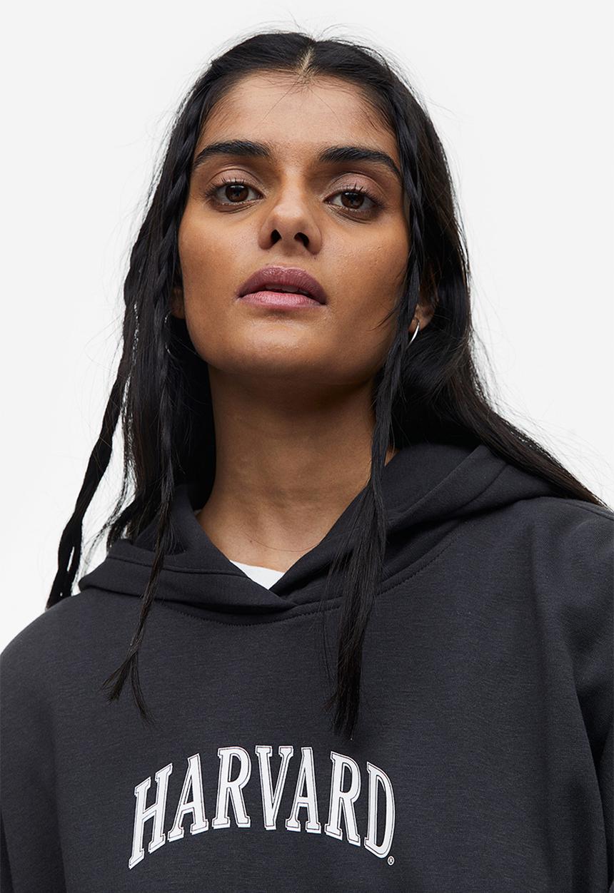 H&M - Oversized printed hoodie - black / harvard