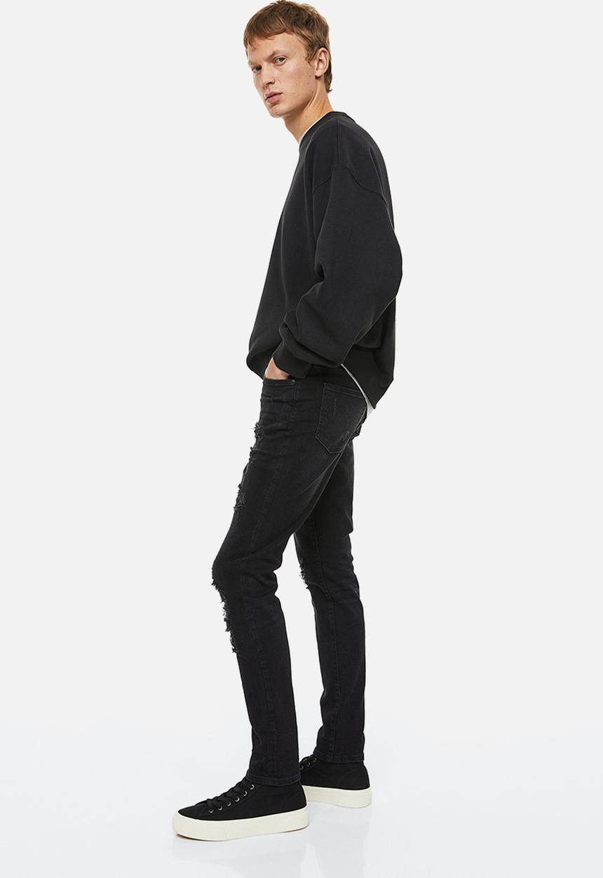 H&M - Skinny jeans - black trashed