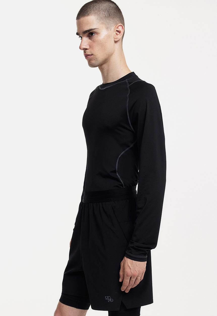 H&M - Drymove™ double-layered sports shorts - black