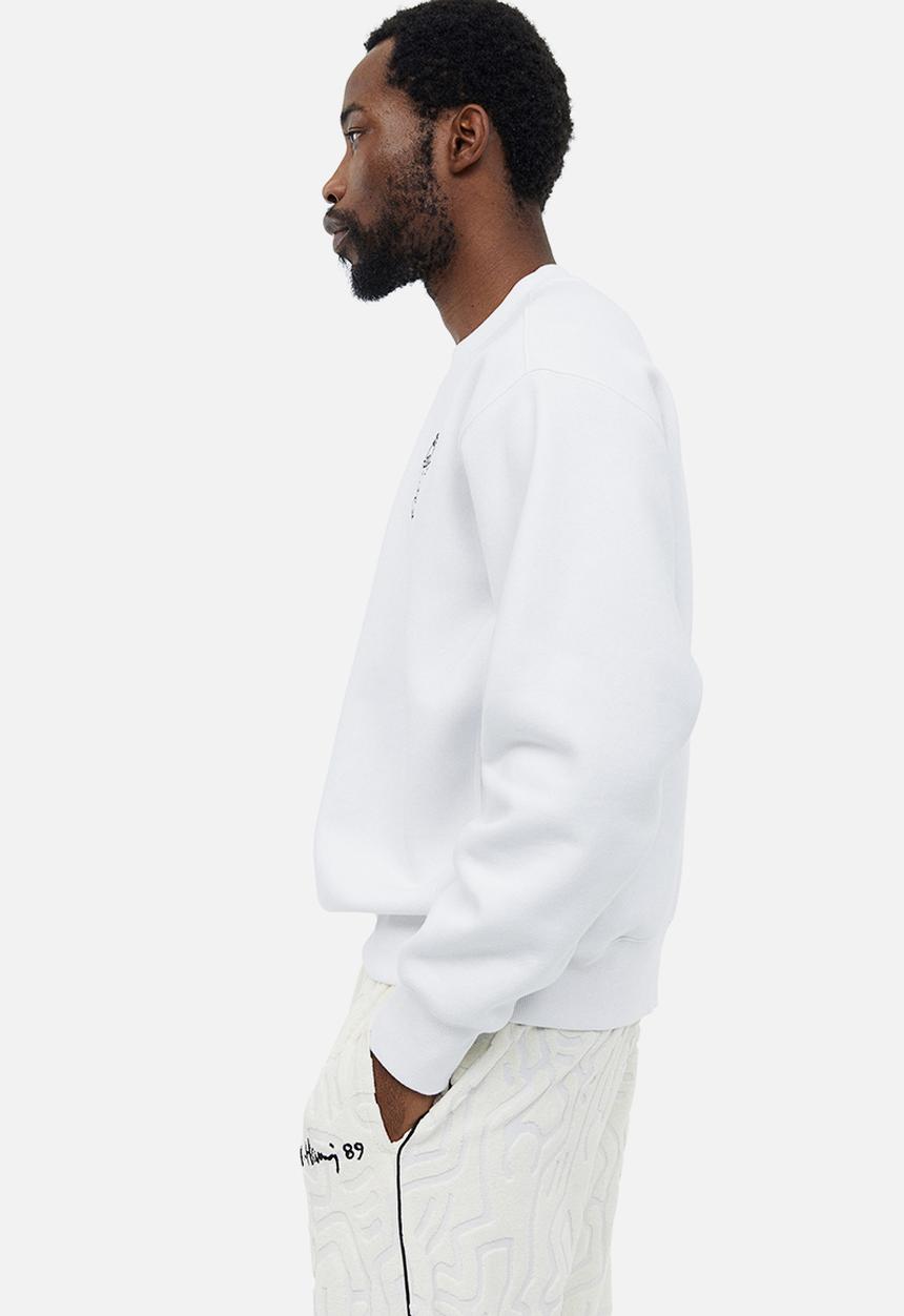 H&M - Oversized fit printed sweatshirt - white keith haring