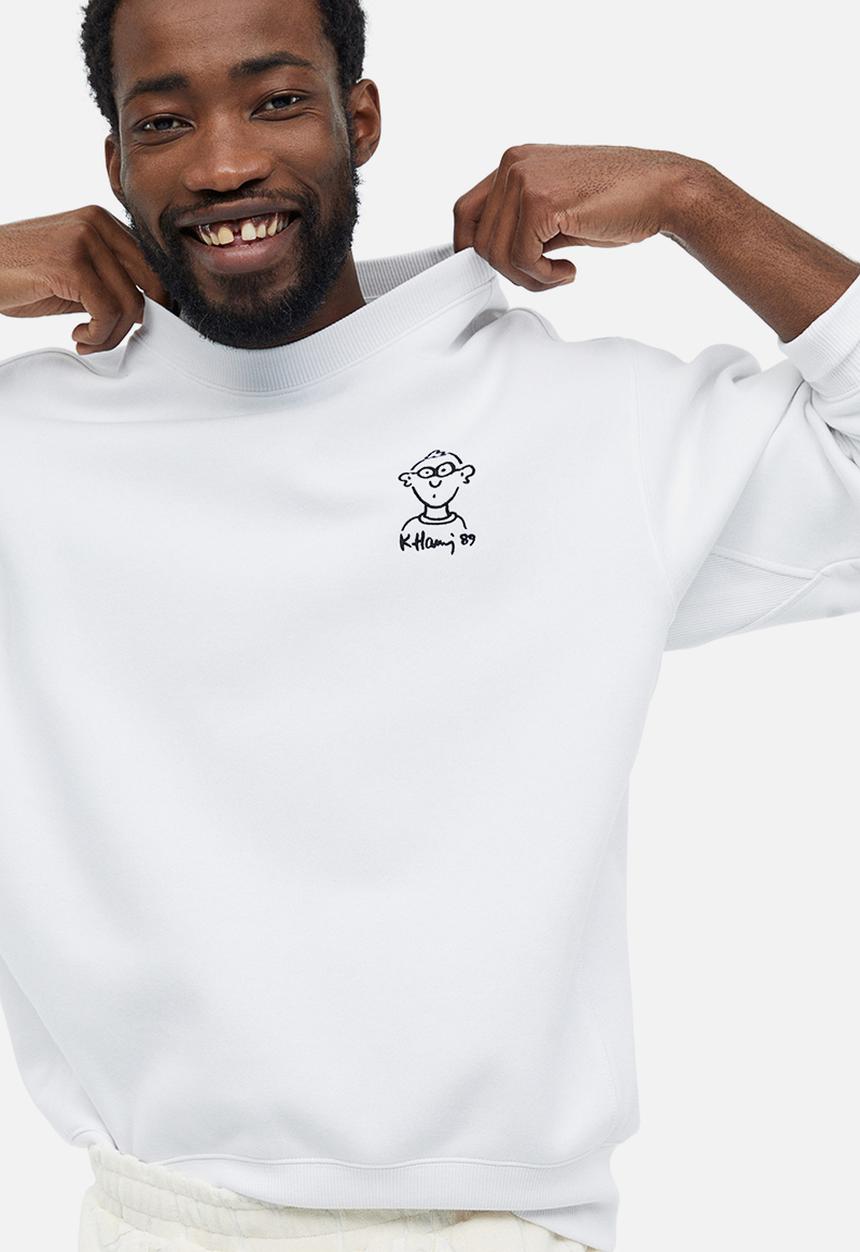 H&M - Oversized fit printed sweatshirt - white keith haring