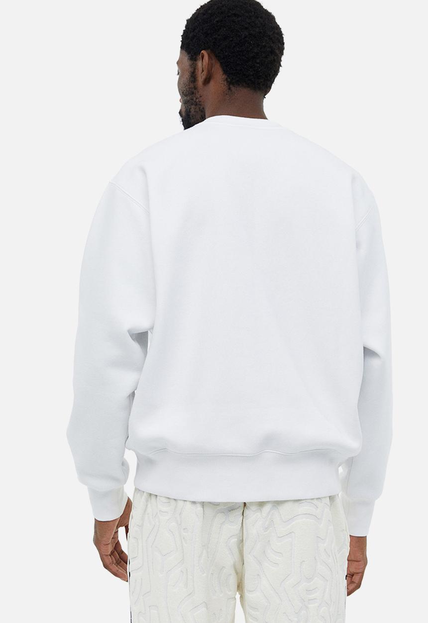 H&M - Oversized fit printed sweatshirt - white keith haring