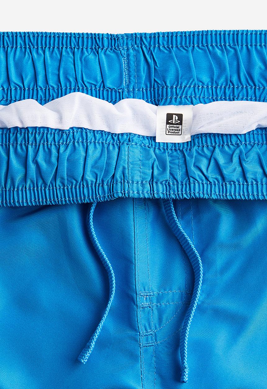 H&M - Printed swim shorts - blue playstation 