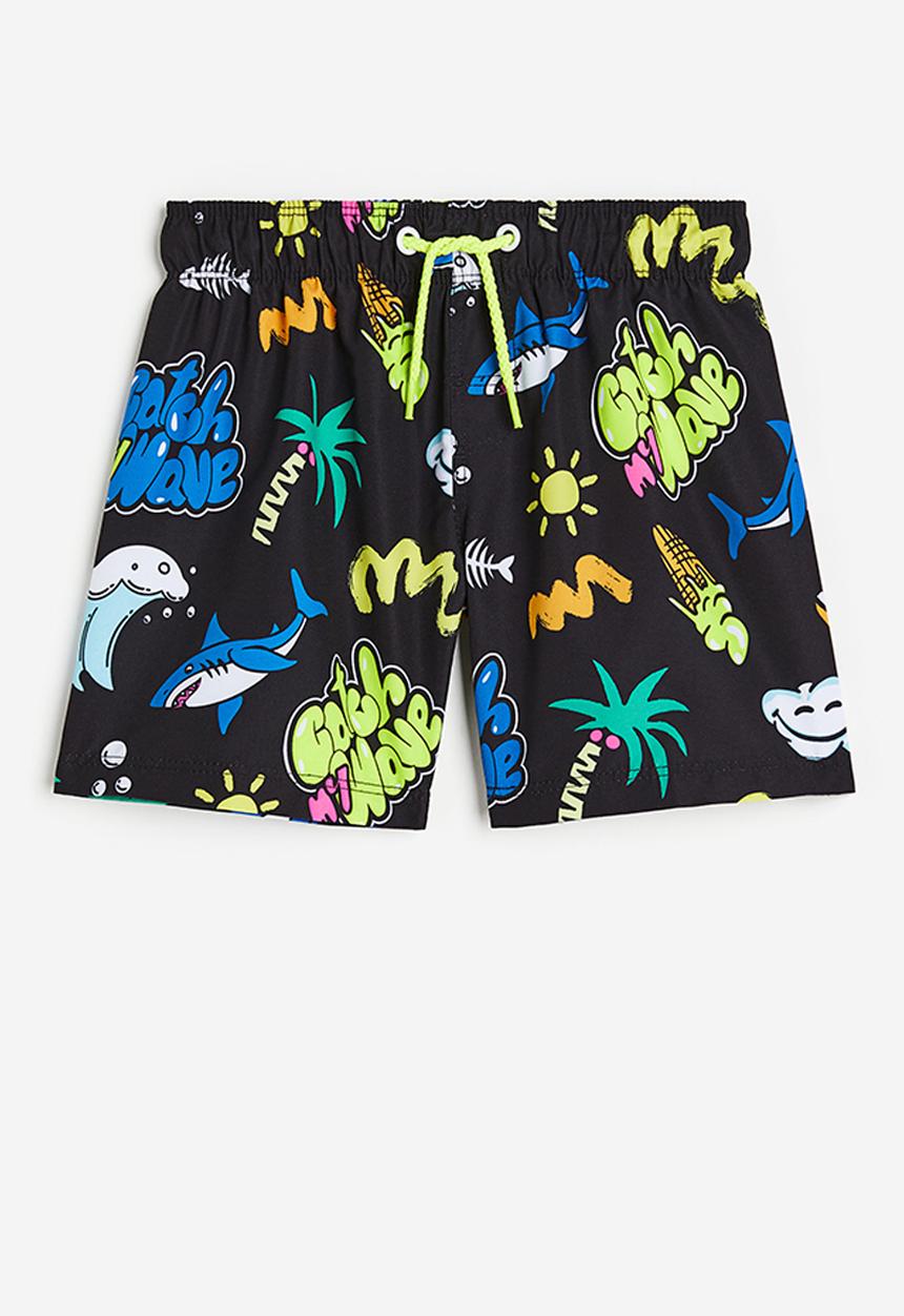 H&M - Patterned swim shorts - black & catch my wave 