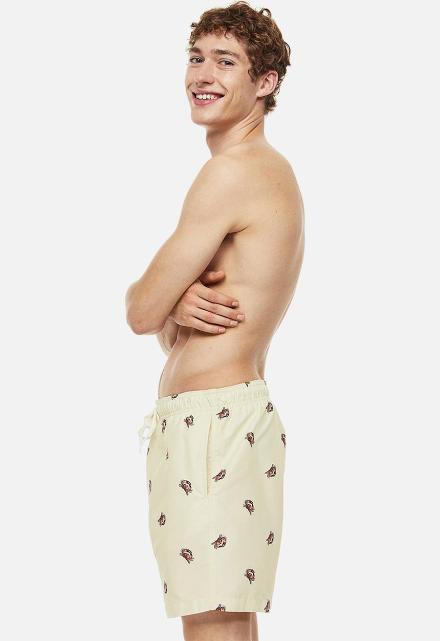 H&M - Patterned swim shorts - light yellow crabs 