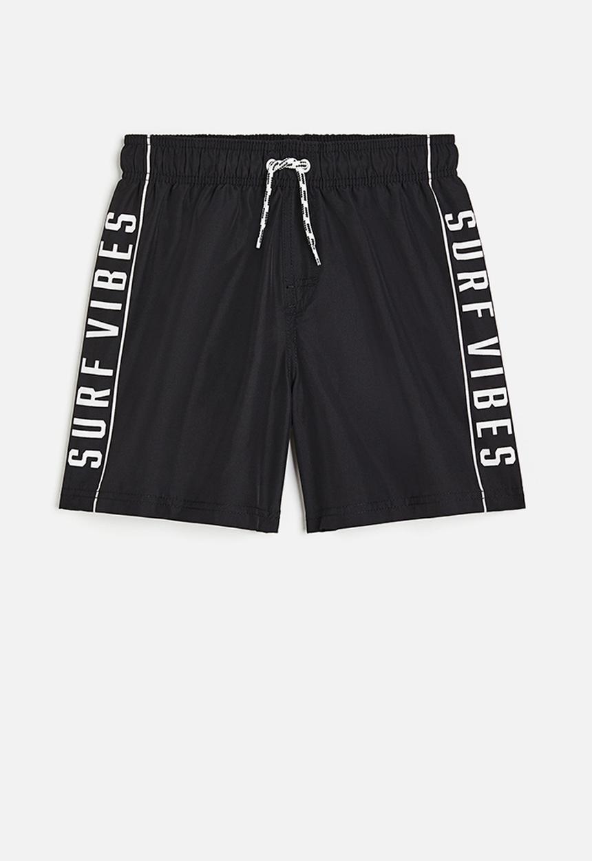 H&M - Swim shorts - black & surf vibes 