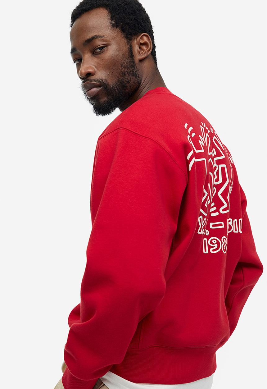 H&M - Oversized fit printed sweatshirt - red keith haring 