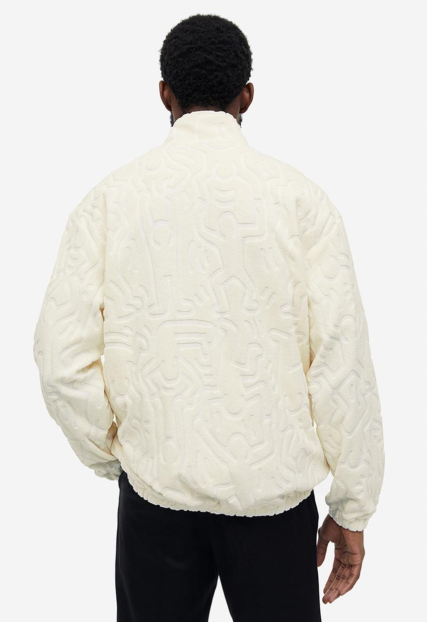 H&M - Relaxed fit terry track jacket - cream keith haring 