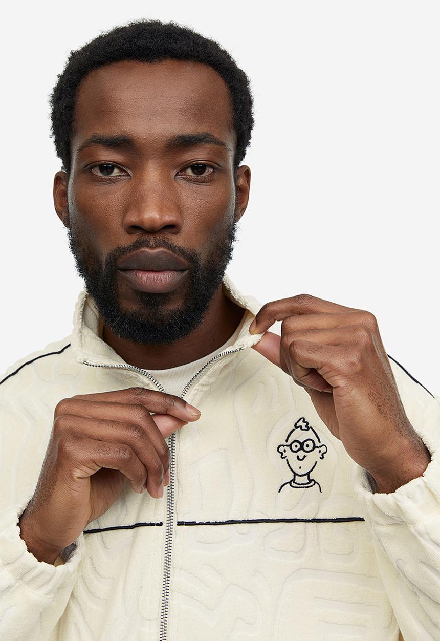 H&M - Relaxed fit terry track jacket - cream keith haring 