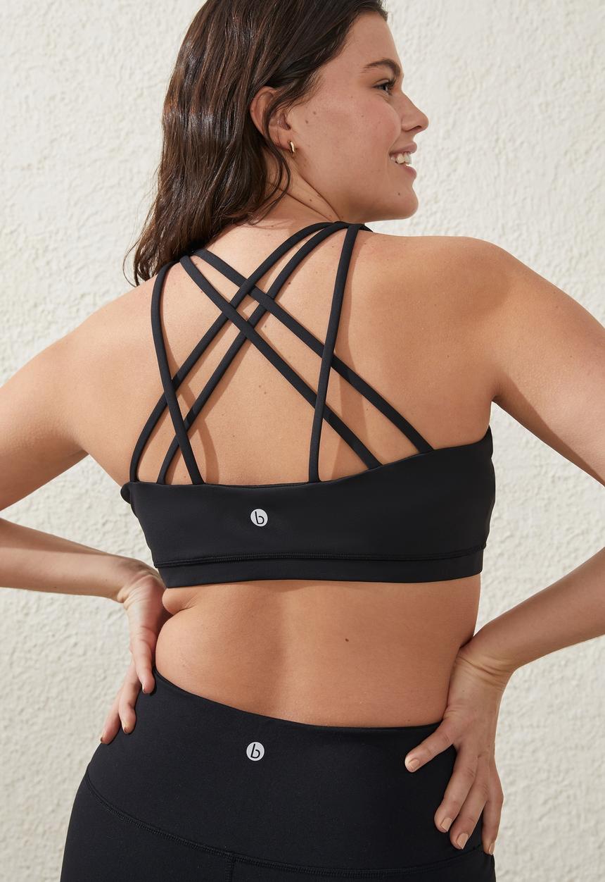 Cotton On - Plus recycled strappy sports crop - black