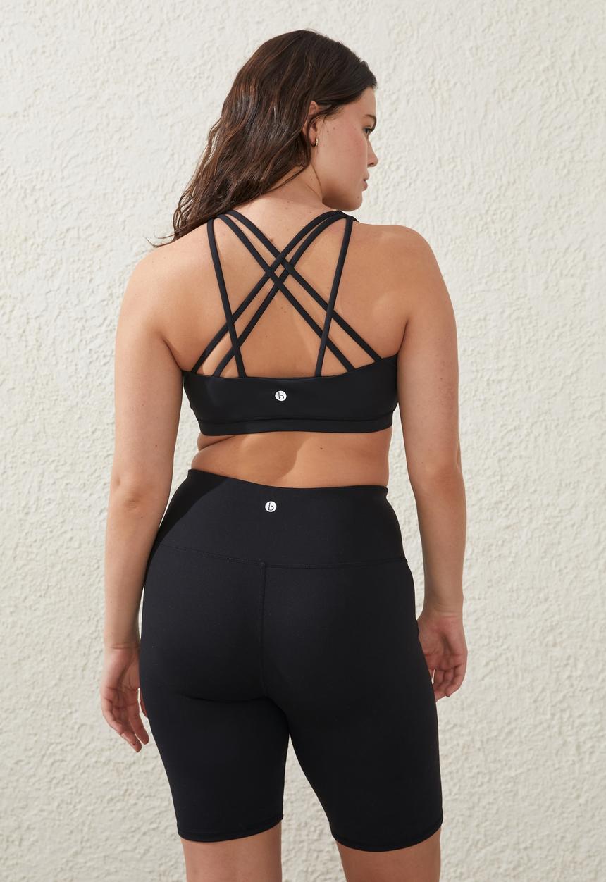 Cotton On - Plus recycled strappy sports crop - black