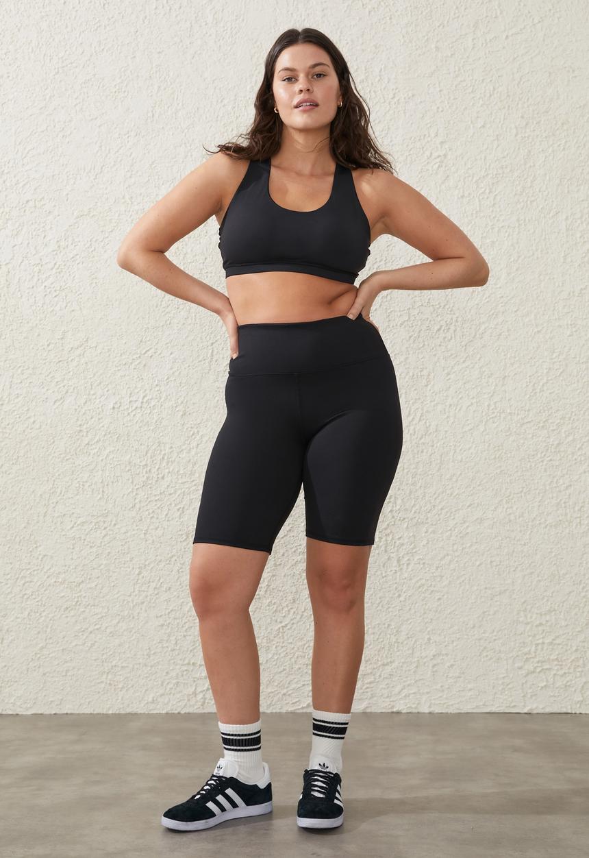 Cotton On - Plus recycled strappy sports crop - black
