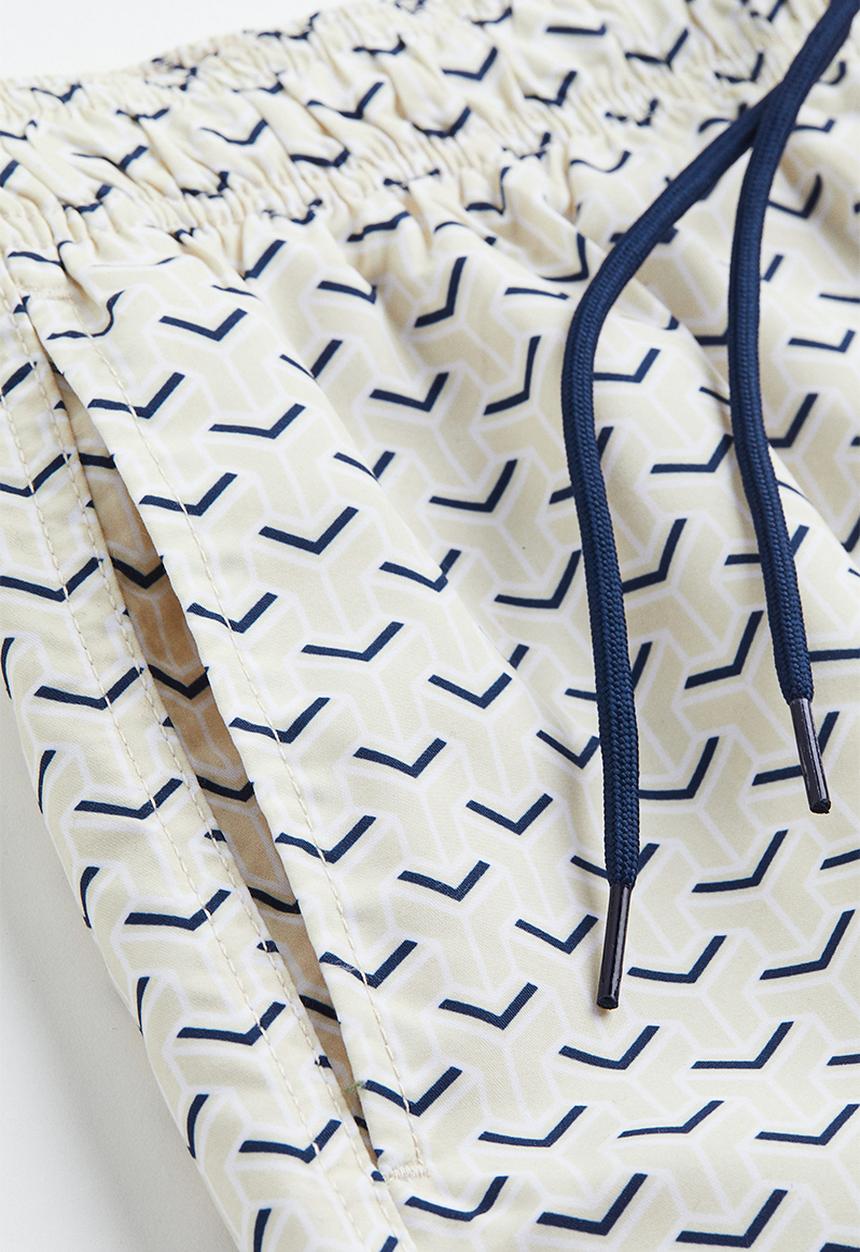 H&M - Patterned swim shorts - light beige patterned