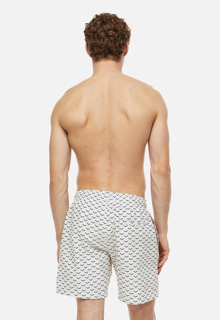 H&M - Patterned swim shorts - light beige patterned