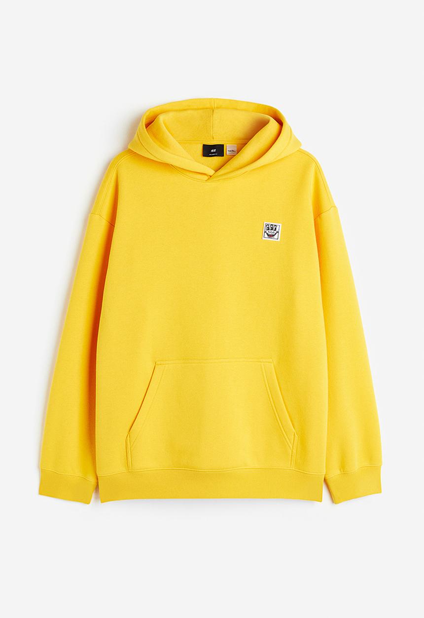H&M - Relaxed fit hoodie - yellow keith haring