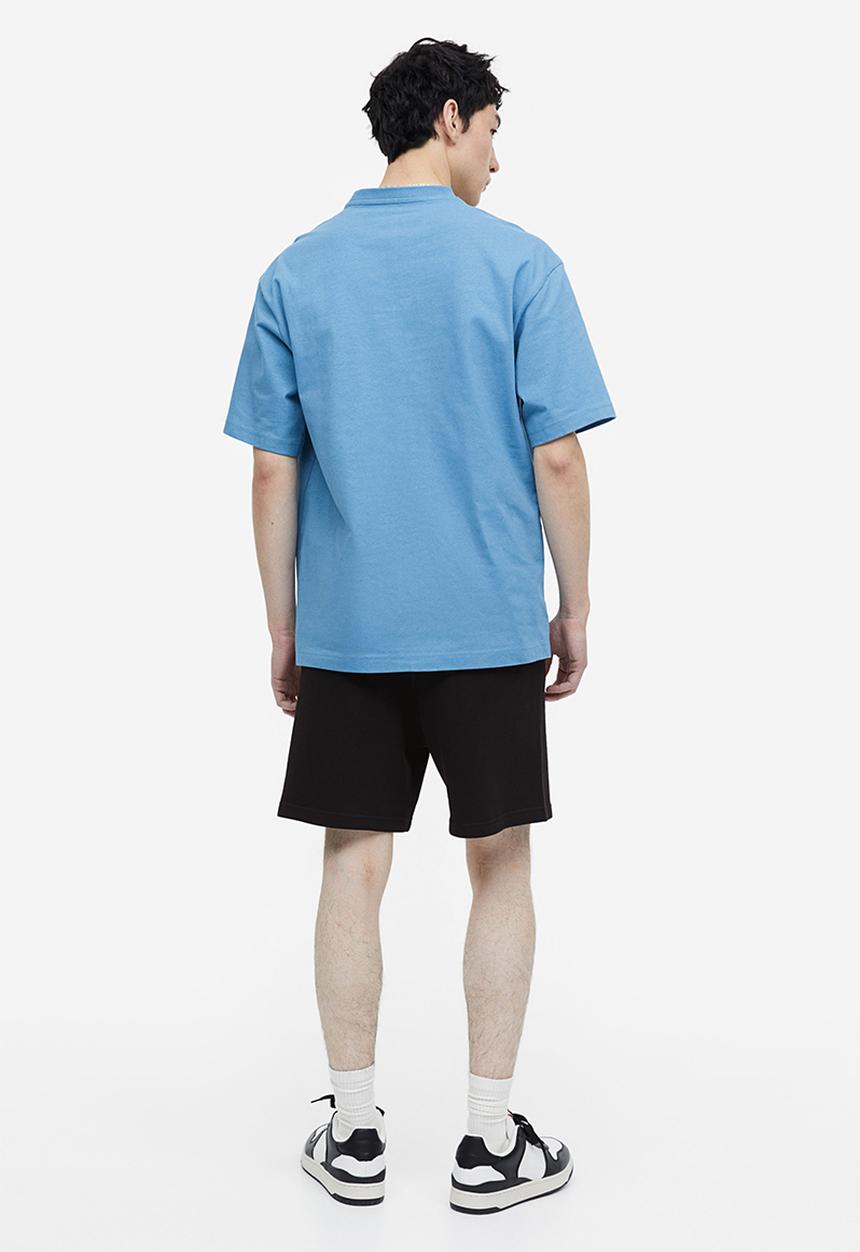 H&M - Relaxed fit printed sweatshorts - black,multi