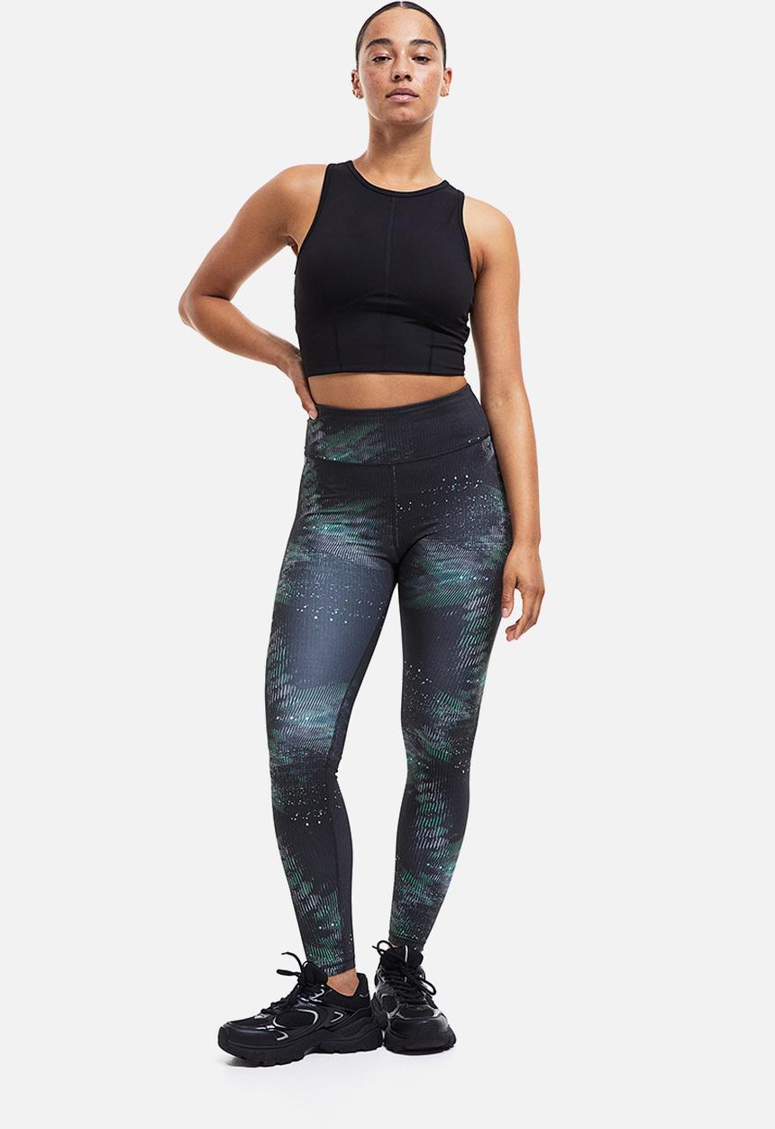 H&M - High waist sports tights - black/patterned