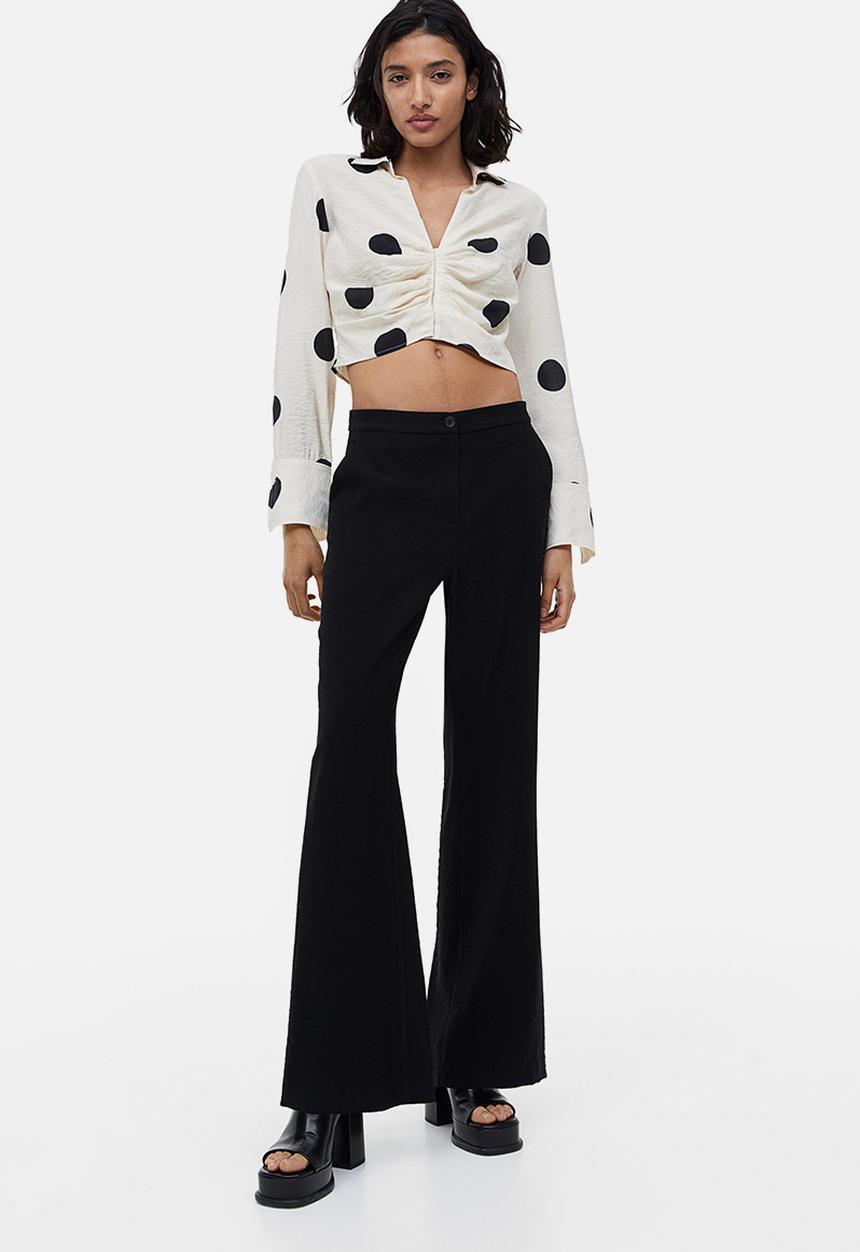 H&M - Flared trousers - black