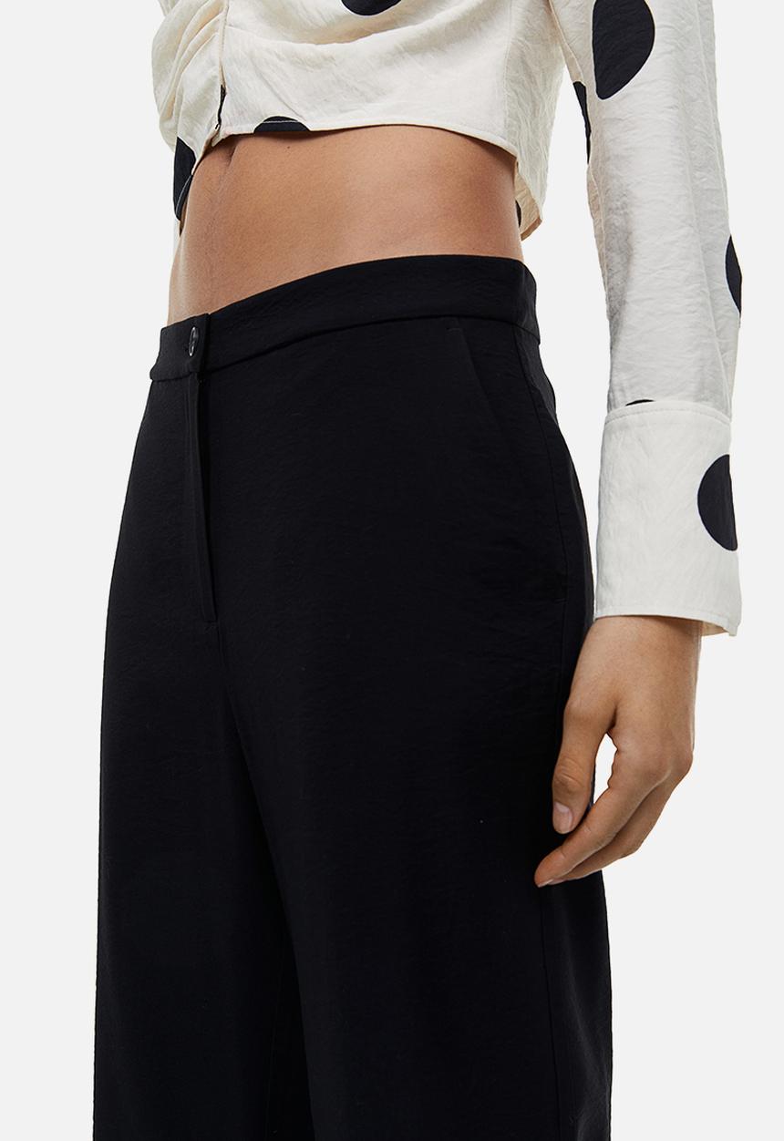H&M - Flared trousers - black