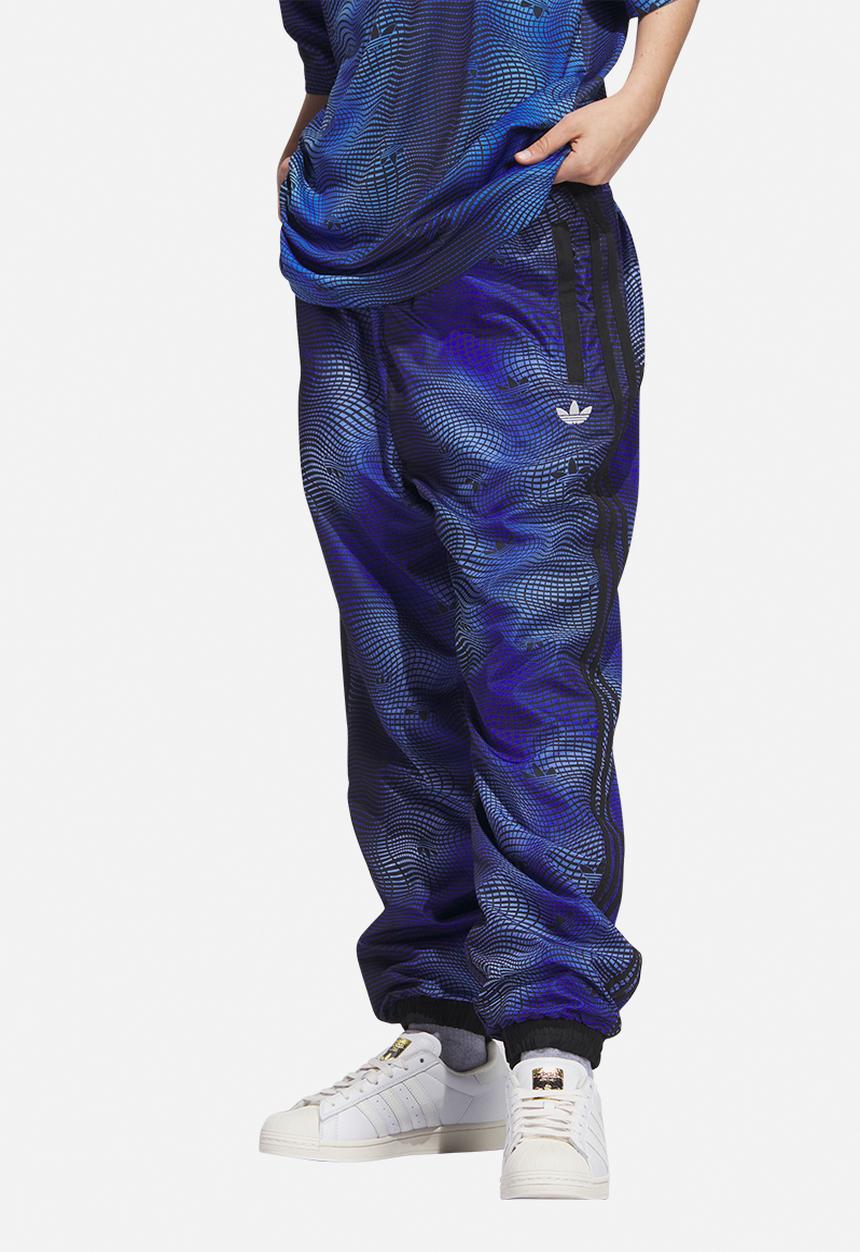 adidas Originals - MV Allover print track pants - blue